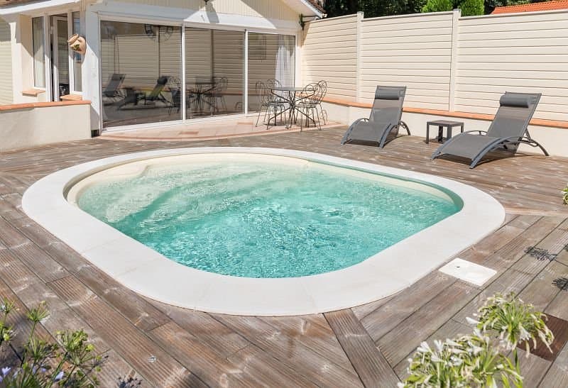 Piscine semi-enterrée CKMER Building